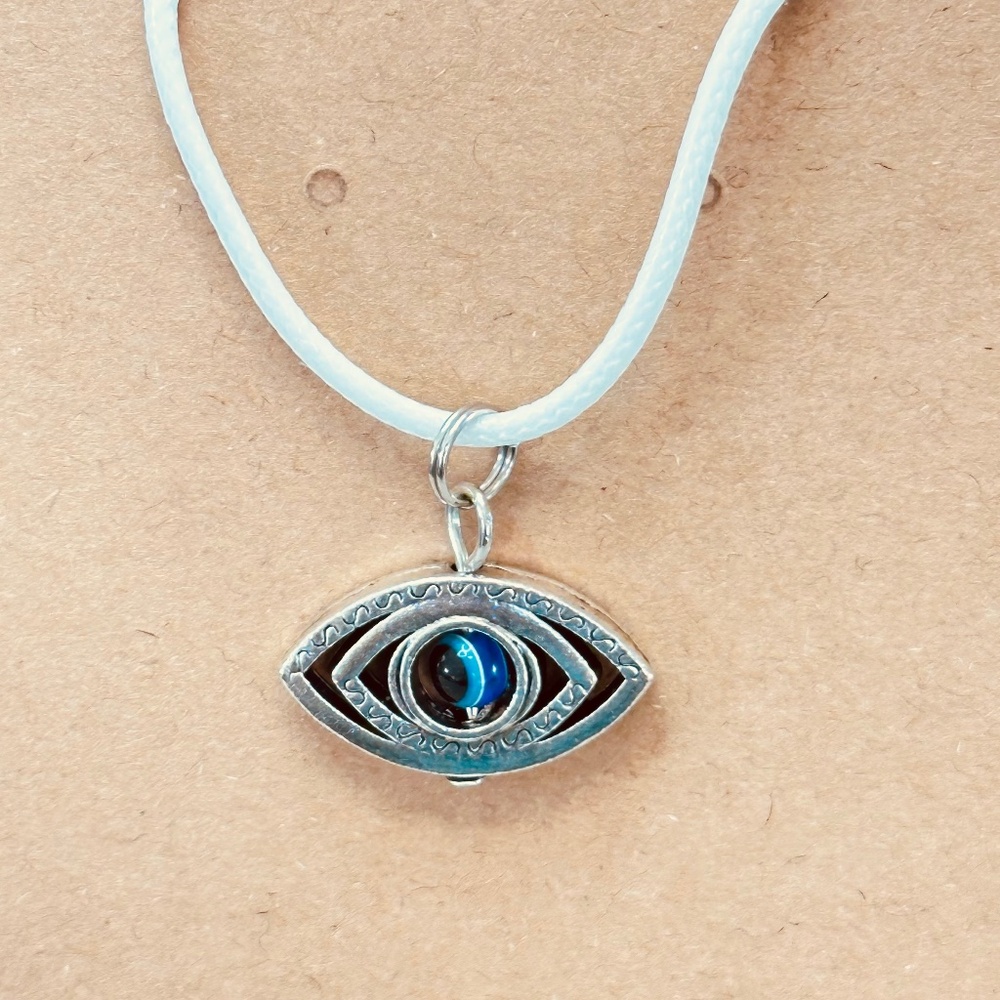 2/$15 Silver tone Blue evil eye charm w/moving eyeball Eye of protection